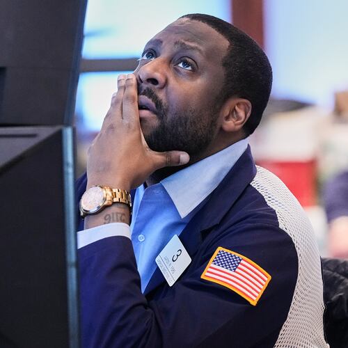 Trader Aaron Ford works on the floor of the New York Stock Exchange, Thursday, May 7, 2026. (AP Photo/Richard Drew)