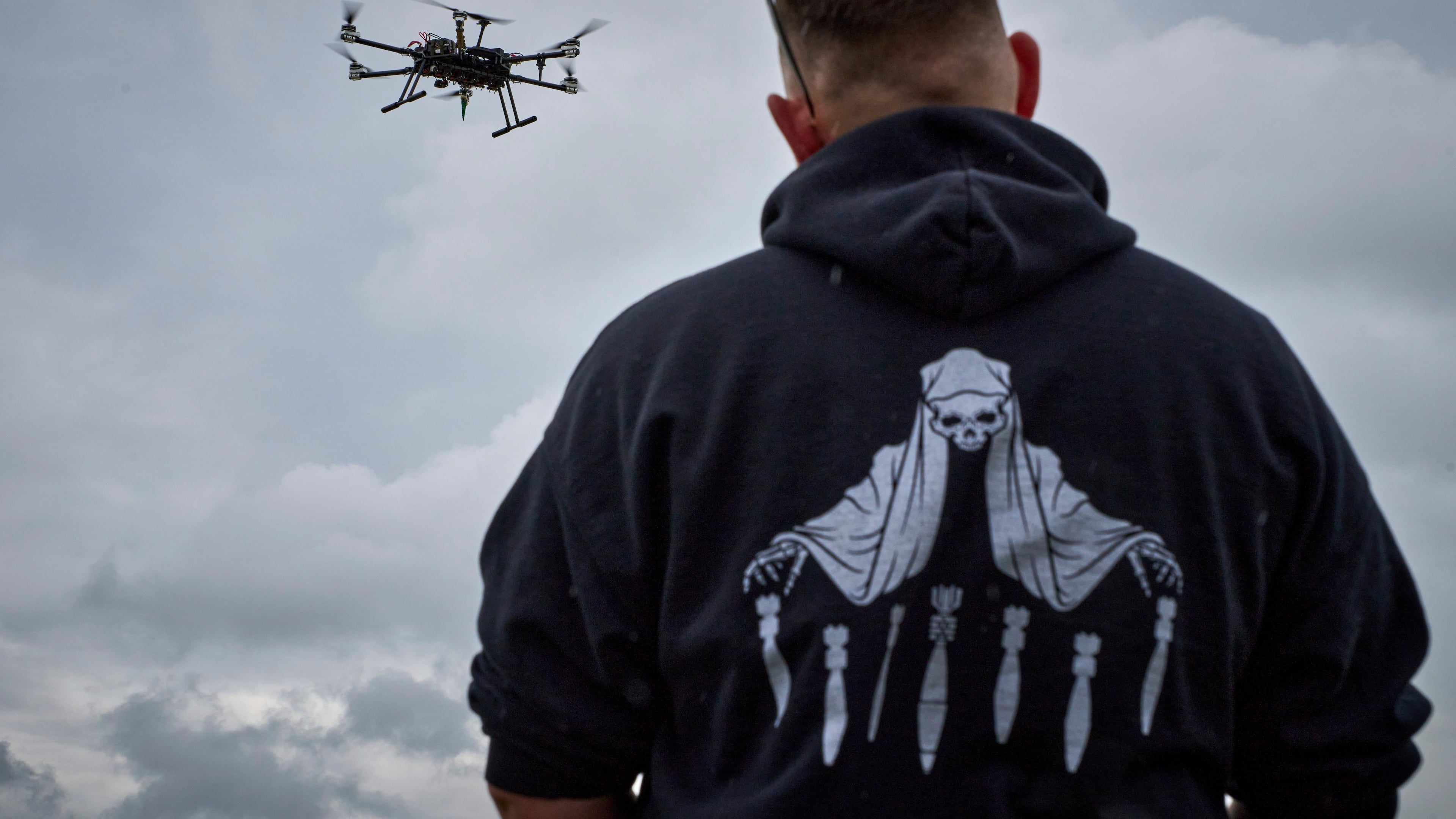 FILE - An engineer watches a Ukrainian-made quadcopter drone at an undisclosed location in Ukraine, June 12, 2025. (AP Photo/Efrem Lukatsky)