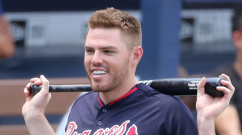Freddie Freeman hasn’t had much smile about on the field lately, batting .189 (10-for-53) with one double, one homer and one RBI in his past 14 games before Sunday’s series finale against the Dodgers. (Curtis Compton/AJC file photo)