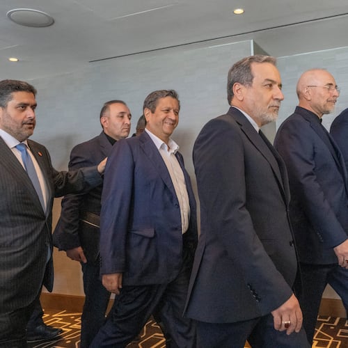 Minister of Foreign Affairs of Iran, Seyyed Abbas Araghchi, 3rd from right, and Speaker of the Islamic Parliament of Iran, Mohammed Bagher Ghalibaf, 2nd from right, with the Delegation of Iran at the Lake Lucerne Summit at the Buergenstock resort in Obbuergen, near Lucerne, Switzerland, Sunday, June 21, 2026. (Urs Flueeler, Pool Photo via AP)