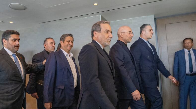 Minister of Foreign Affairs of Iran, Seyyed Abbas Araghchi, 3rd from right, and Speaker of the Islamic Parliament of Iran, Mohammed Bagher Ghalibaf, 2nd from right, with the Delegation of Iran at the Lake Lucerne Summit at the Buergenstock resort in Obbuergen, near Lucerne, Switzerland, Sunday, June 21, 2026. (Urs Flueeler, Pool Photo via AP)