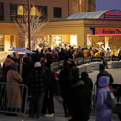 Audience members line up outside the Eccles Theatre during the Sundance Film Festival on Friday, Jan. 23, 2026, in Park City, Utah. (Photo by Charles Sykes/Invision/AP)