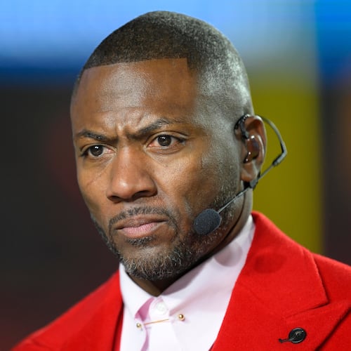 FILE - ESPN Monday Night Football Countdown commentator Ryan Clark looks to the cameras during warmups before an NFL football game between the Kansas City Chiefs and the Washington Commanders, Oct. 27, 2025 in Kansas City, Mo. (AP Photo/Reed Hoffmann, File)