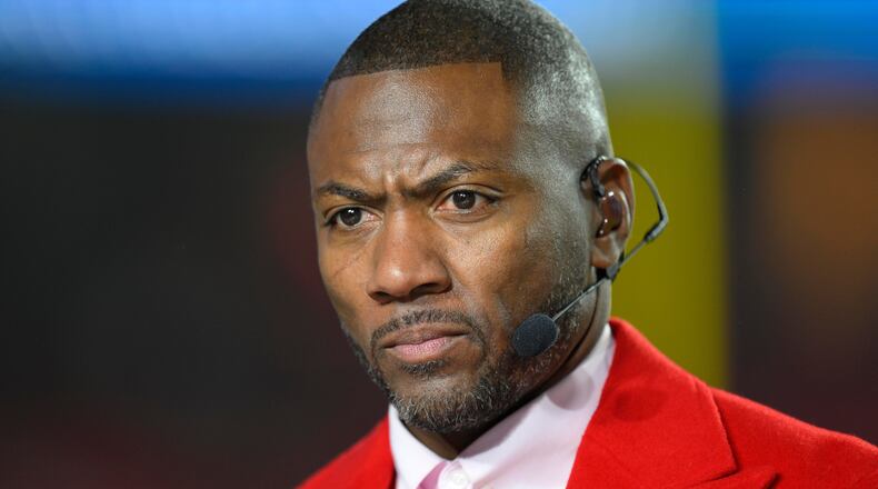 FILE - ESPN Monday Night Football Countdown commentator Ryan Clark looks to the cameras during warmups before an NFL football game between the Kansas City Chiefs and the Washington Commanders, Oct. 27, 2025 in Kansas City, Mo. (AP Photo/Reed Hoffmann, File)