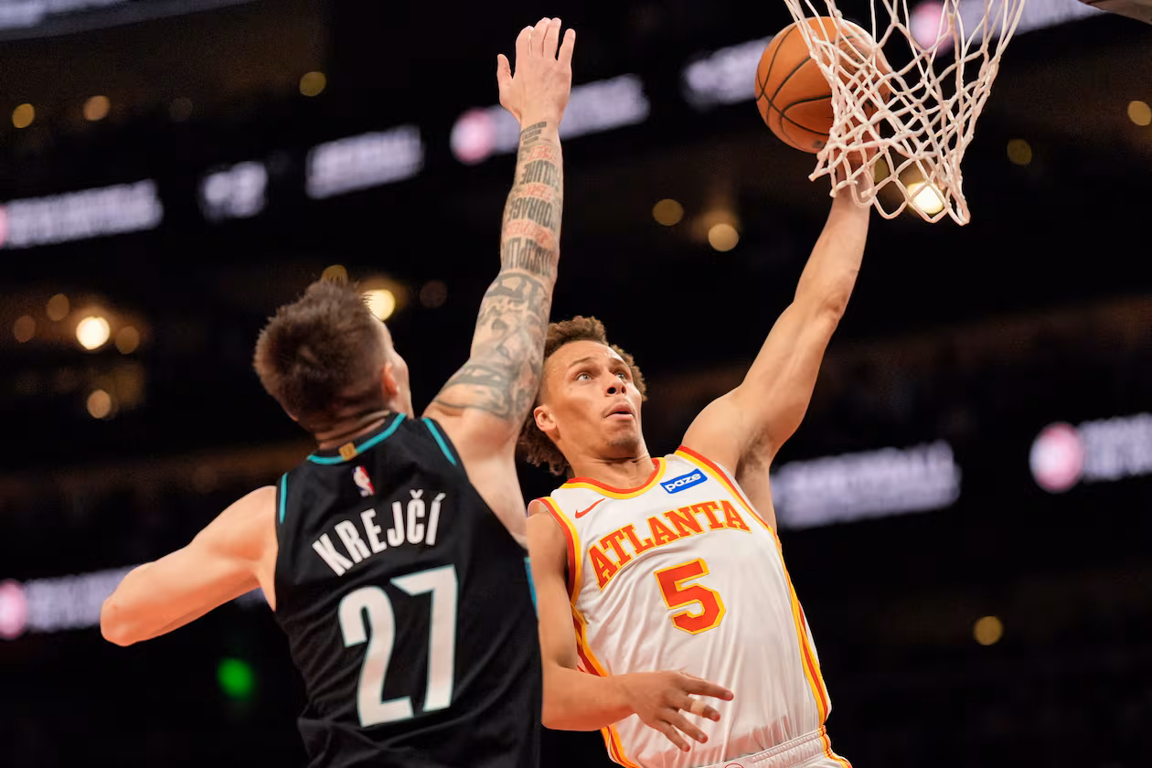 Atlanta Hawks guard Dyson Daniels shoots against Portland Trail Blazers guard Vit Krejci during the first half of an NBA basketball game, Sunday, March 1, 2026, in Atlanta. (Mike Stewart/AP)