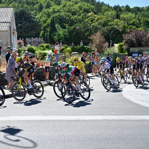 People watch the break away riders during the seventh stage of the Women's Tour de France cycling race (Tour de France Femmes) between La Voulte-sur-Rhone and Mont Ventoux in Malaucene, France, Friday, Aug. 7, 2026. (AP Photo/Philippe Magoni)