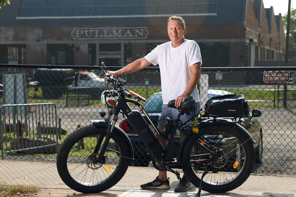Edgewood resident and bicyclist Jim Stringer collided with a vehicle in March 2024 near Pullman Yards during the Balloon Museum exhibit and said he watched as an ambulance crawled through the heavy traffic to reach him and the other driver. (Jason Getz/AJC)
