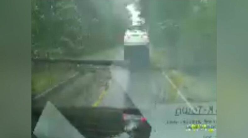 Dashcam video captured the moment a tree fell in front of a woman driving down the road during Tropical Storm Irma.