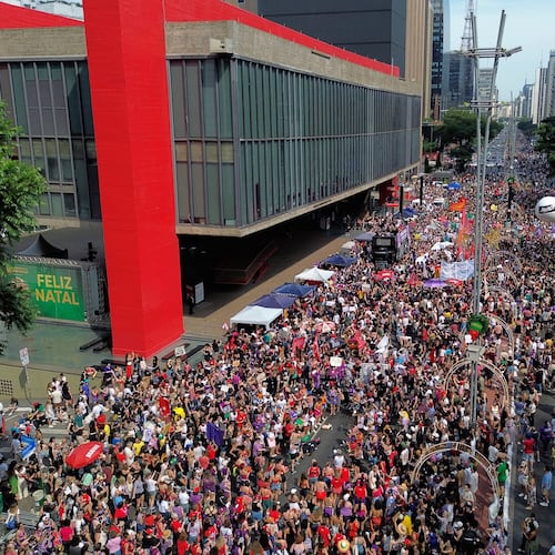 Demonstrators take parte in a march against femicide following a series of high-profile cases in the country, in Sao Paulo, Sunday, Dec. 7, 2025. (AP Photo/Ettore Chiereguini)
