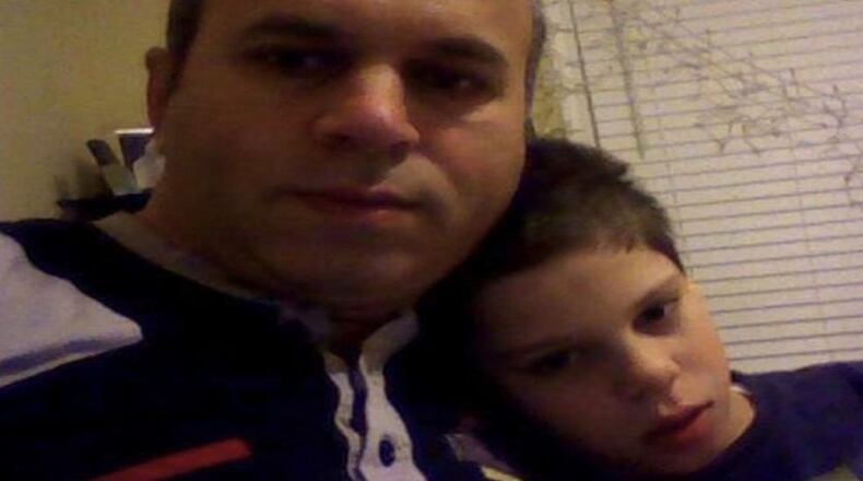 Fikri Erdem and son Hakan, 12. (Credit: Channel 2 Action News)