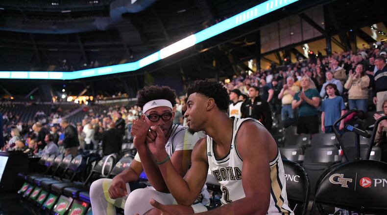 Georgia Tech guard Shembari Phillips (right) and center James Banks sit on the bench prior to the Yellow Jackets' game against Pittsburgh March 5, 2020 at McCamish Pavilion. (Danny Karnick/Georgia Tech Athletics)