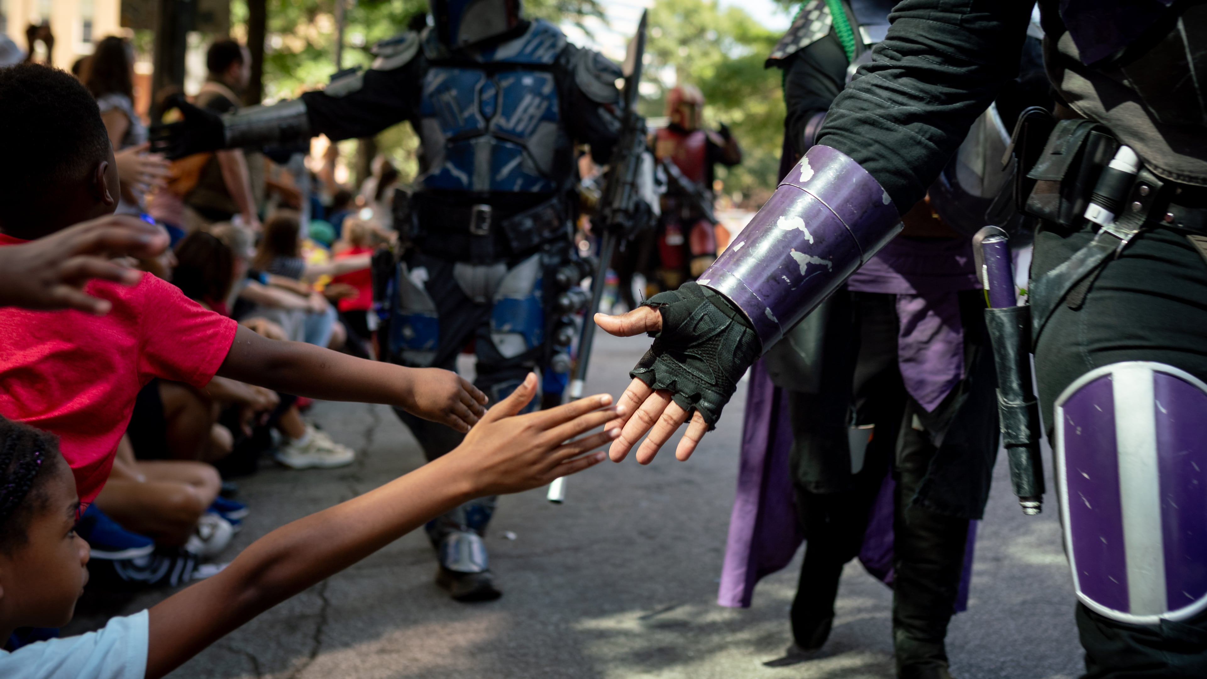 Thousands lined up along Peachtree Street on Saturday morning, Aug. 31, 2024, for the annual Dragon Con parade in Atlanta. (Ben Hendren for The Atlanta Journal-Constitution)