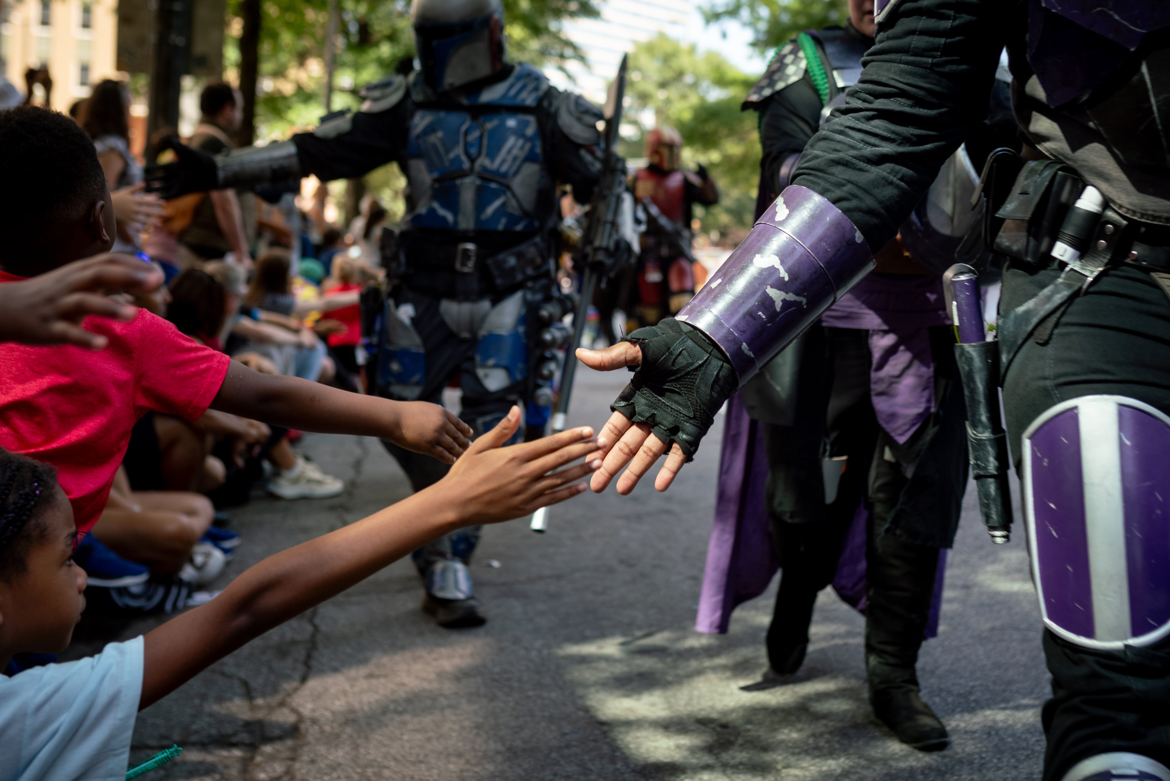 Thousands lined up along Peachtree Street on Saturday morning, August 31, 2024, for the annual Dragon Con parade in Atlanta. (Ben Hendren for The Atlanta Journal-Constitution)
