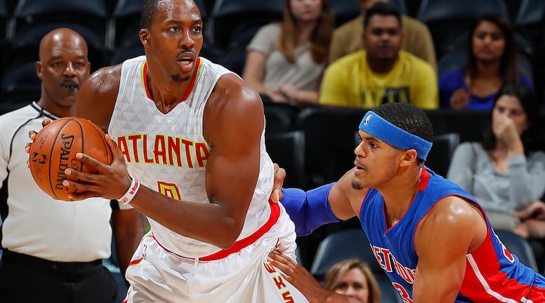 Dwight Howard of the Hawks looks to drive against Tobias Harris of the Pistons at Philips Arena on October 13, 2016 in Atlanta, Georgia. (Photo by Kevin C. Cox/Getty Images)