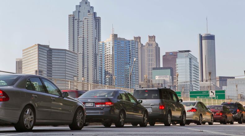 Illustration photo with no caption to go with 072712 pro tsplost ed. File photo from May 24, 2012 Atlanta: I-75 / I-85 connector morning commuter traffic near North Avenue encapsulates the daily traffic reality in Atlanta on Thursday, May 24, 2012. Friday will bring even more congestion as the Memorial Day weekend begins. JOHN SPINK / JSPINK@AJC.COM An always relevant file photo of Atlanta traffic in 2012. (AJC/John Spink)