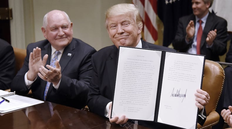 U.S. President Donald J. Trump and U.S. Secretary of Agriculture Sonny Perdue, former governor of Georgia, promoted the new USMCA as a better deal for America's farmers, consumers and workers, with more market access to Canada and Mexico. (Olivier Douliery/Abaca Press/TNS)