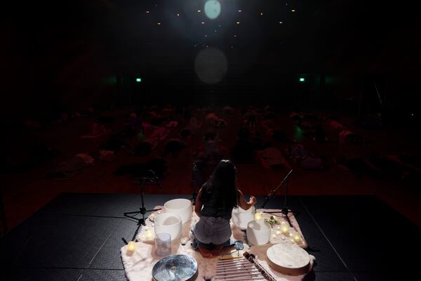 Malinie Feeney, a master sound teacher and yoga instructor, describes the popular wellness trend as a curated sonic journey with a simple pitch: “A sound bath is a lazy form of meditation,” she says. (Arvin Temkar/AJC)