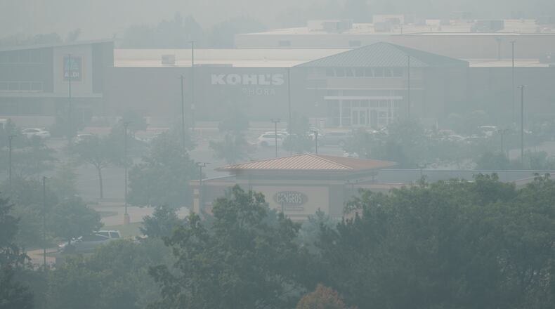 A general view of street mall during poor air quality due to dense smoke from Canadian wildfires in Glenview, Ill., Thursday, July 16, 2026. (AP Photo/Nam Y. Huh) CORRECTION: Glenview, not Northbrook