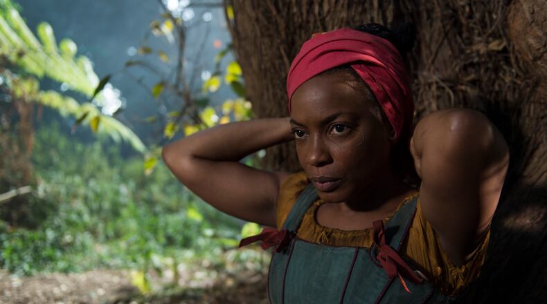 Scene 2.7 - EXT Appleby's Plantation - Woods; Georgia (Sandra Caldwell) teaches Aminata (Aunjanue Ellis) to read. Aunjanue Ellis plays Aminata Dialla in "The Book of Negroes" on BET. CREDIT: BET