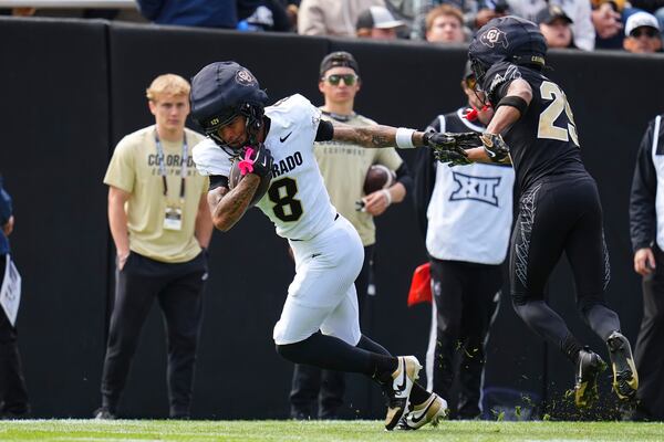 Colorado wide receiver Joseph Williams (8) runs against cornerback Ivan Yates (29) during an NCAA college football spring game, Saturday, April 19, 2025, in Boulder, Colo. (AP PhotoJack Dempsey)