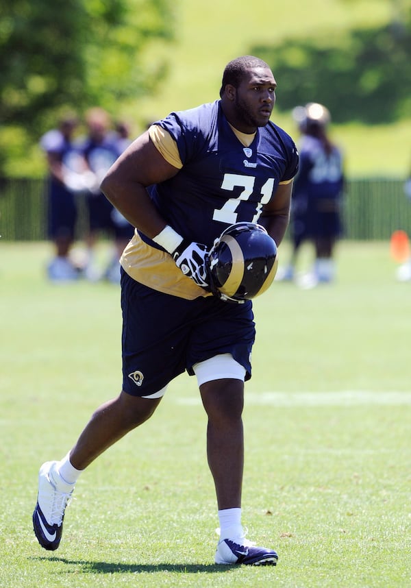 FILE - St. Louis Ram's Terrell Brown (71) runs during NFL training camp on Friday, May, 24, 2013, at the team's training facility in St. Louis. (AP Photo/Bill Boyce, File)