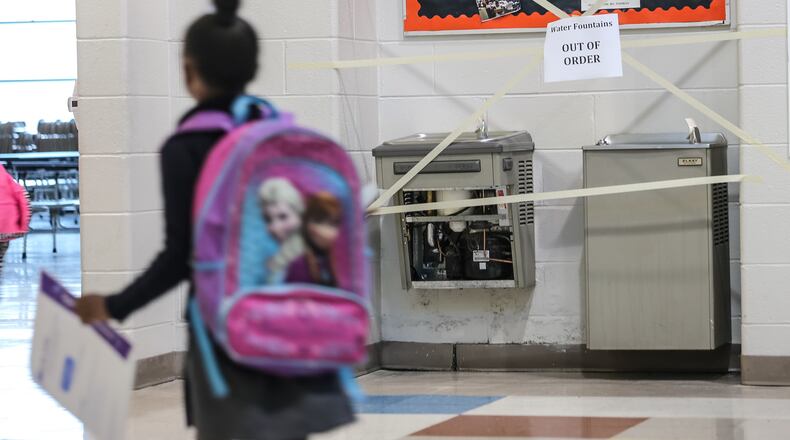 Centennial Place was one of 17 schools affected by the advisory, district spokeswoman Jill Strickland Luse said. JOHN SPINK / JSPINK@AJC.COM