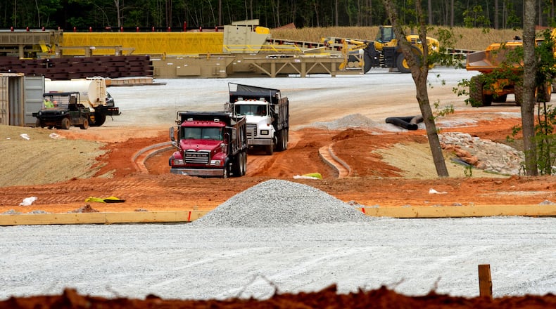 For now, construction is continuing on the Metro Green recycling plant across the street from the Decatur-area subdivision Windsor Downs. STEVE SCHAEFER FOR THE ATLANTA JOURNAL-CONSTITUTION