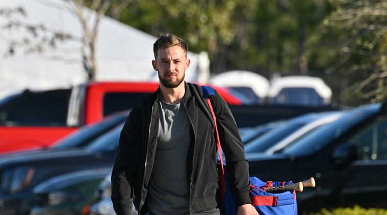 Atlanta Braves center fielder Eli White arrives for the third of the Braves spring training at CoolToday Park, Wednesday, Feb. 15, 2023, in North Port, Fla.. (Hyosub Shin / Hyosub.Shin@ajc.com)