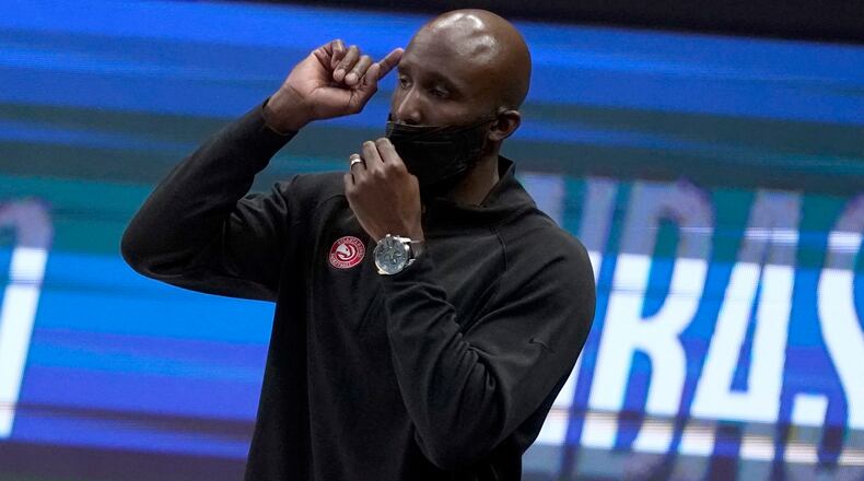 Atlanta Hawks head coach Lloyd Pierce instructs his team against the Dallas Mavericks Wednesday, Feb. 10, 2021, in Dallas. (Tony Gutierrez/AP)