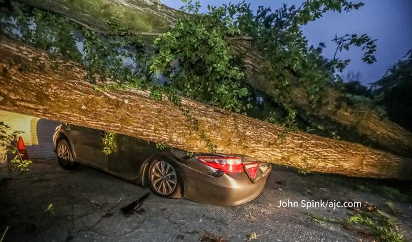 A tree fell on a home in the 500 block of Brownlee Road in southwest Atlanta on Thursday morning as storms with gusty winds moved into the region.