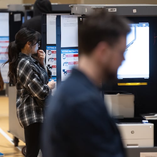 Trisha Perry contemplates her vote at the Don And Mary Ellen Harp Student Center located at 3209 Mathieson Place NE in Atlanta on Tuesday, Nov. 5, 2024 on Election Day. The state of Georgia was on track to break voter turnout records as presidential candidates, Republican Donald Trump and Democrat Kamala Harris, went head-to-head in this pivotal swing state. (John Spink/AJC)