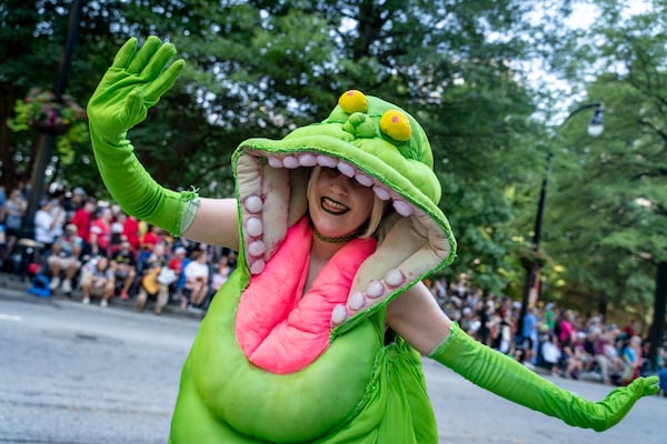 Thousands lined up along Peachtree Street on Saturday morning, August 31, 2024, for the annual Dragon Con parade in Atlanta. (Ben Hendren for The Atlanta Journal-Constitution)