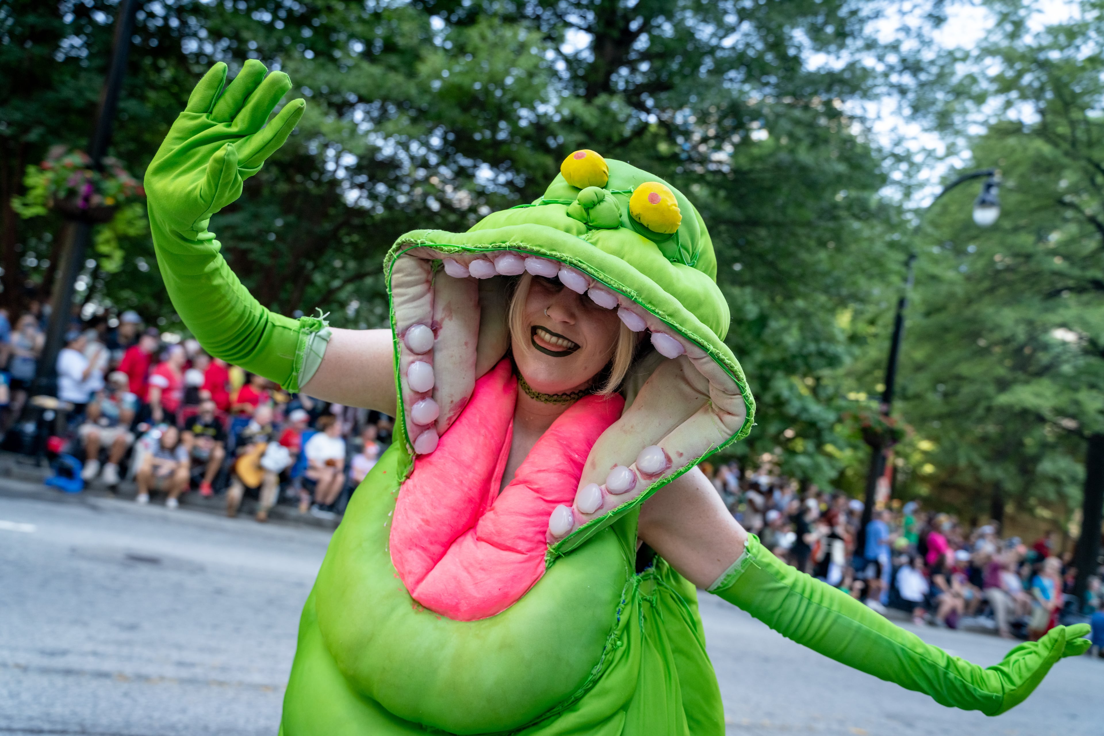 Thousands lined up along Peachtree Street on Saturday morning, August 31, 2024, for the annual Dragon Con parade in Atlanta. For five days, Atlanta is going to be the epicenter of pop culture and an estimated 70,000 people are expected to partake in the annual multi-genre convention. (Ben Hendren for The Atlanta Journal-Constitution)