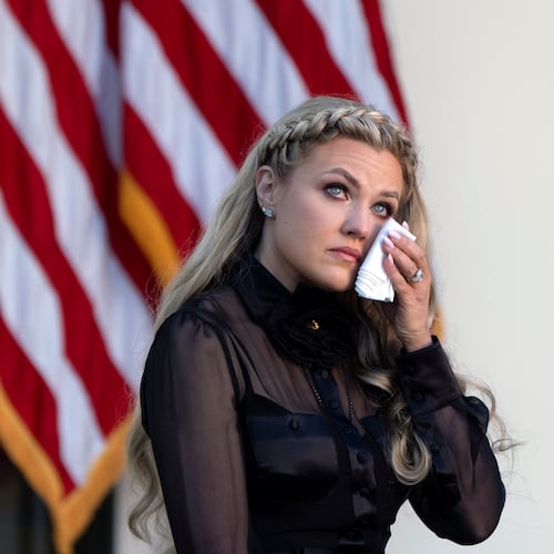 Erika Kirk reacts after President Donald Trump posthumously awarded the Presidential Medal of Freedom to her late husband Charlie Kirk, in the Rose Garden of the White House, Tuesday, Oct. 14, 2025, in Washington. (AP Photo/Mark Schiefelbein)