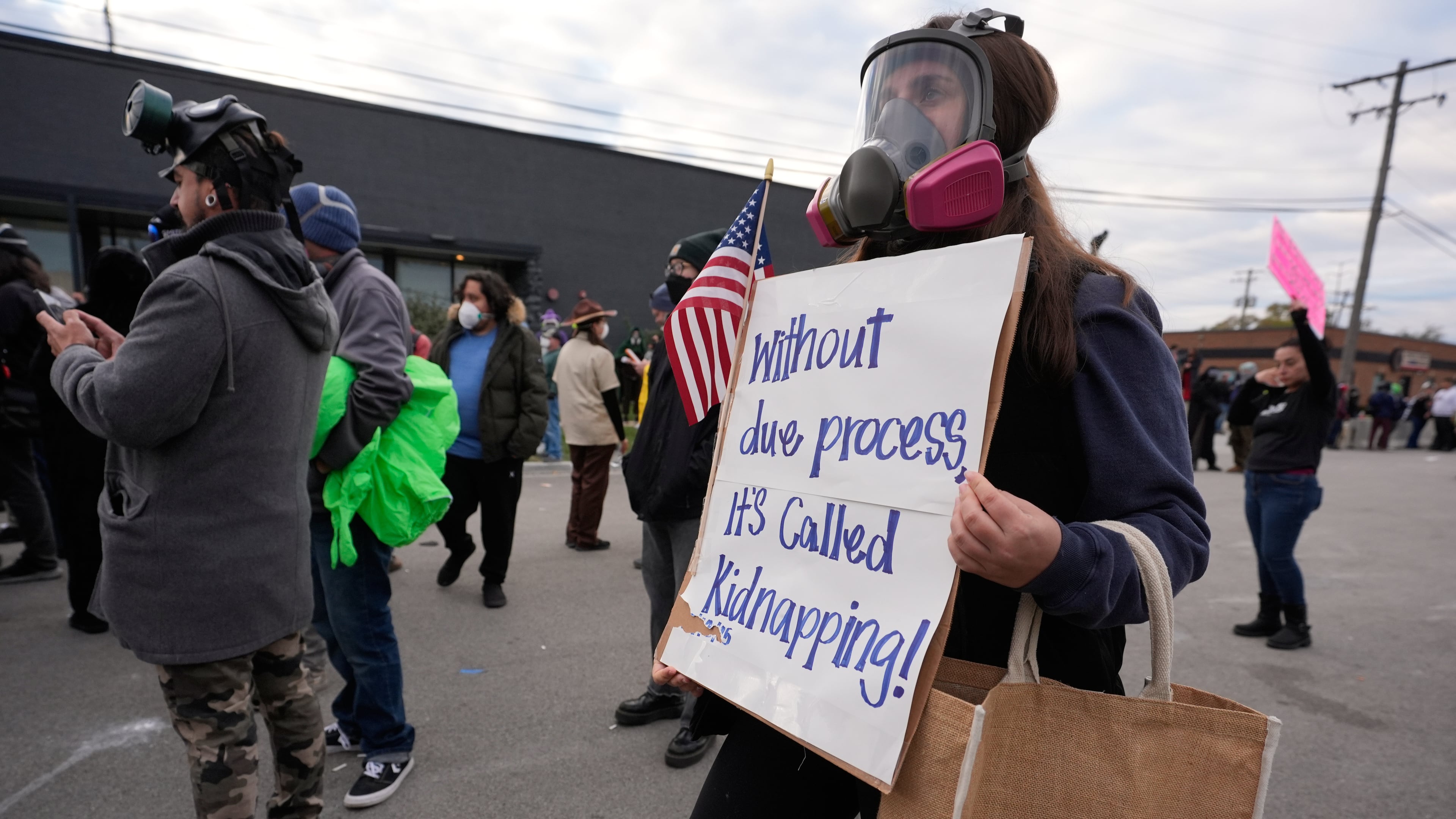 Protesters gather outside an ICE processing facility in the Chicago suburb of Broadview, Ill., Saturday, Nov. 1, 2025. (AP Photo/Alex Brandon)