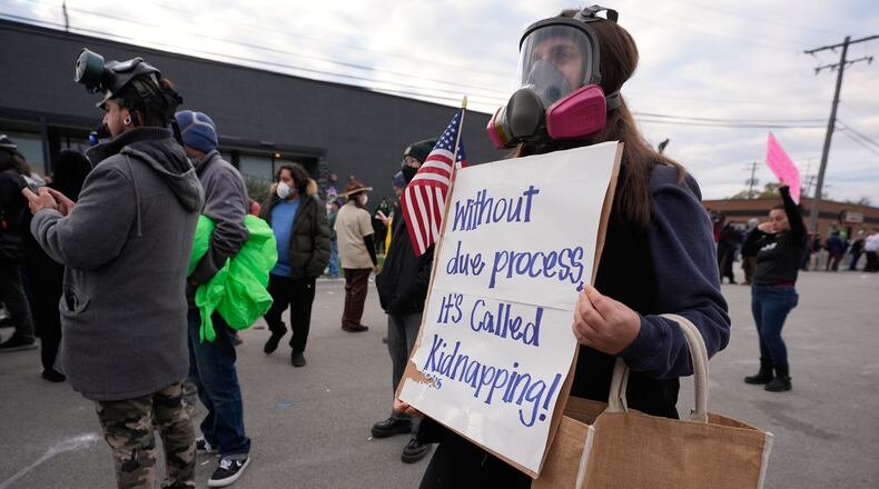 Protesters gather outside an ICE processing facility in the Chicago suburb of Broadview, Ill., Saturday, Nov. 1, 2025. (AP Photo/Alex Brandon)