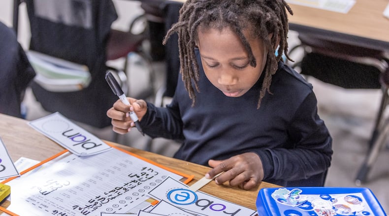 Kimberly Elementary School student Patrick Holloway works on his reading skills during class Tuesday, Dec. 5, 2023. The Atlanta school, like others in the state, is focusing on enhancing literacy skills. (Steve Schaefer/steve.schaefer@ajc.com)