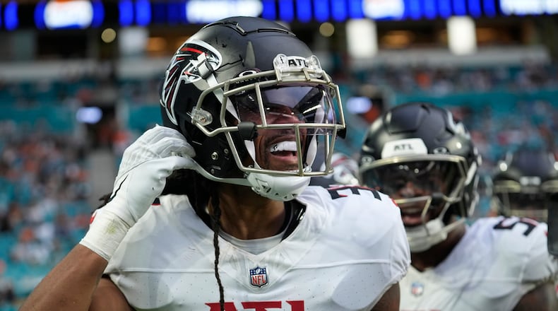 Atlanta Falcons cornerback Kevin King (32) celebrates an interception during the game against the Miami Dolphins, Friday, Aug. 9, 2024, in Miami Gardens, Fla. (AP Photo/Lynne Sladky)