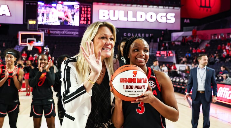 Georgia coach Katie Abrahamson-Henderson and guard Diamond Battles will make their second trip in two seasons to Carver-Hawkeye Arena in Iowa City, Iowa, when the Bulldogs meet Florida State in the NCAA Tournament on Friday. Georgia's coach starred for the Hawkeyes in the 1980s after playing two seasons at UGA. (Photo by Kayla Renie)