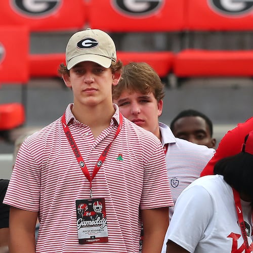 Arch Manning watches the Bulldogs go through pregame warmups before their game against South Carolina on Saturday, Sept 18, 2021, in Athens. Manning was a major recruiting target for Georgia as a 2023 prospect. (AJC 2021)