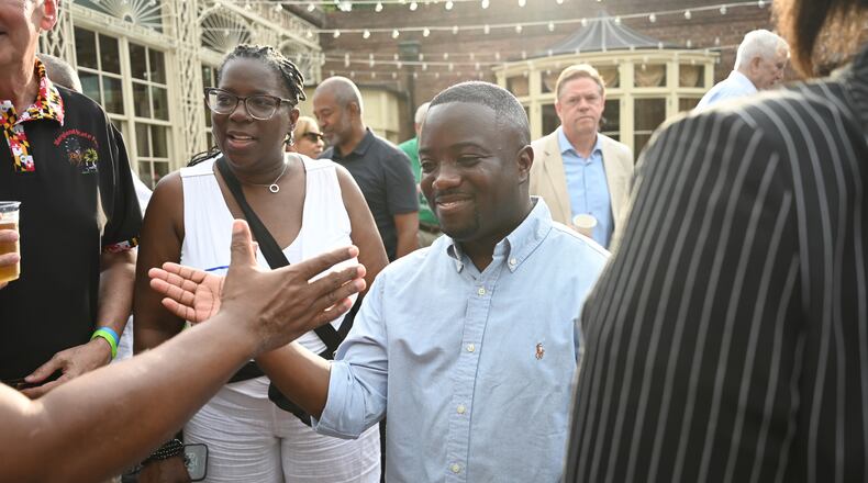 Adrian Boafo, a Maryland state delegate and candidate for U.S. Congress greets supporters at the "AmeriPac Bull Roast" Friday, June 12, 2026, in Mitchellville, Md. (AP Photo/Gail Burton)