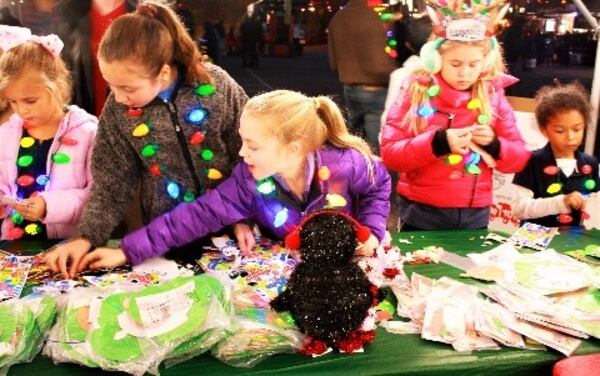 Children participate in a previous Light Up Brookhaven celebration.