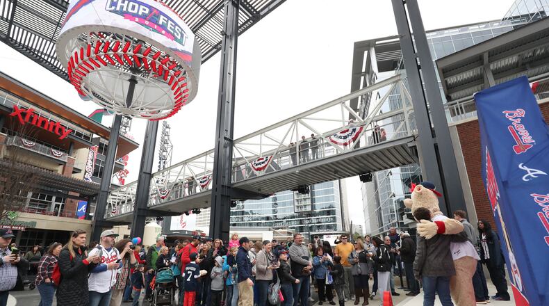 Atlanta Braves mascot Blooper takes photographs with fans during the Atlanta Braves Chop Fest at the Plaza at SunTrust Park Saturday, Jan. 27, 2018, in Atlanta.
