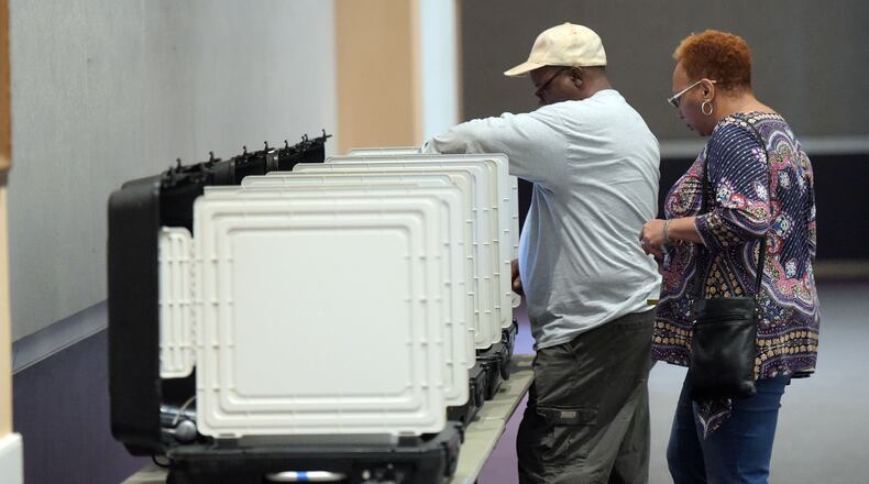 Voters select a mayor and City Council for the new city of Stonecrest on March 21 at the New Birth Missionary Baptist Church polling location. KENT D. JOHNSON/AJC
