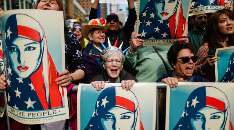 NEW YORK, NY - FEBRUARY 19: People take part in a rally called ‘I Am A Muslim Too’ in a show of solidarity with American Muslims at Times Square on February 19, 2017, in New York City. The Trump administration’s revised travel ban is scheduled to take effect Thursday morning amid legal challenges. (Photo by Eduardo Munoz Alvarez/Getty Images)