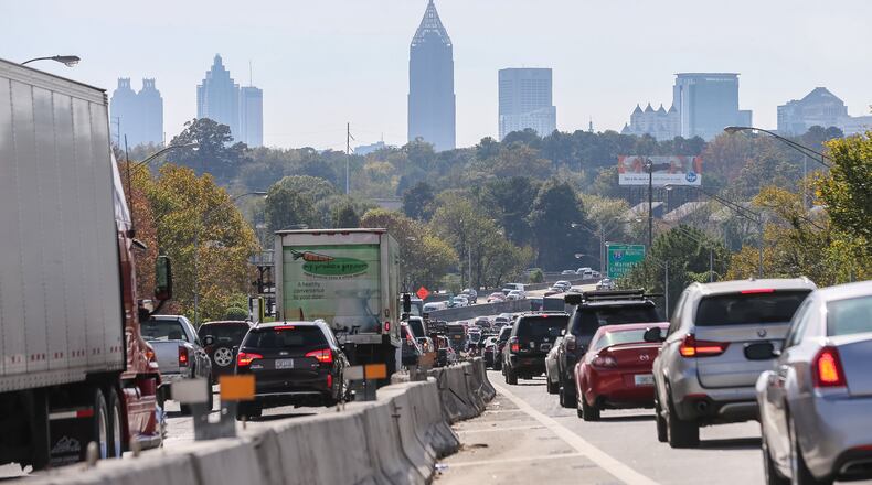 Smoke in some parts of metro Atlanta is not the result of new wildfires, according to the Georgia Forestry Commission. JOHN SPINK / JSPINK@AJC.COM