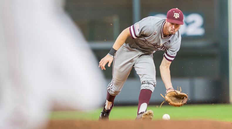 Texas A&M Aggies shortstop Braden Shewmake (8) fields a ground ball in the 2019 Shriners Hospitals for Children College Classic baseball game between the Texas A&M Aggies and the Houston Cougars March 3, 2019, at Minute Maid Park in Houston.