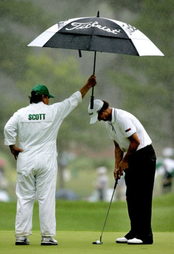 Umbrellas fill Augusta National