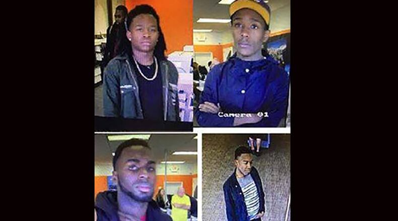 The Roswell Police Department is searching for four men they say are responsible for mobile phone thefts at AT&T stores in Roswell, Marietta, Woodstock and Conyers.