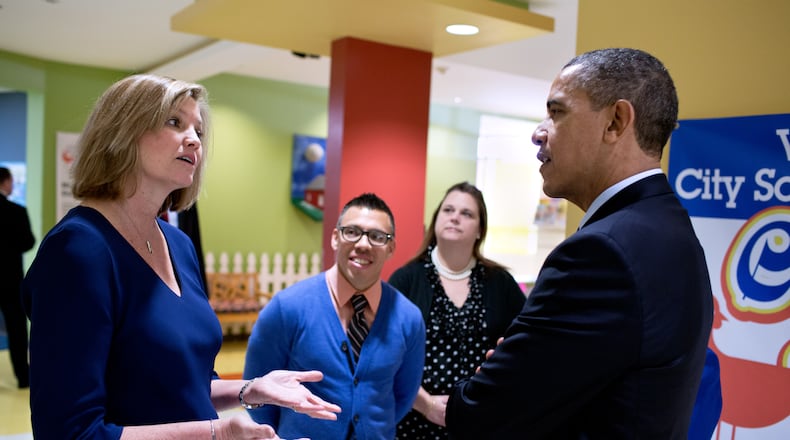 Suzanne Kennedy chats with President Barack Obama during his visit to Decatur’s College Heights Early Childhood Learning Center in this Feb. 14, 2013 file photo.